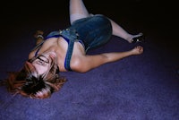 a woman laying on the floor